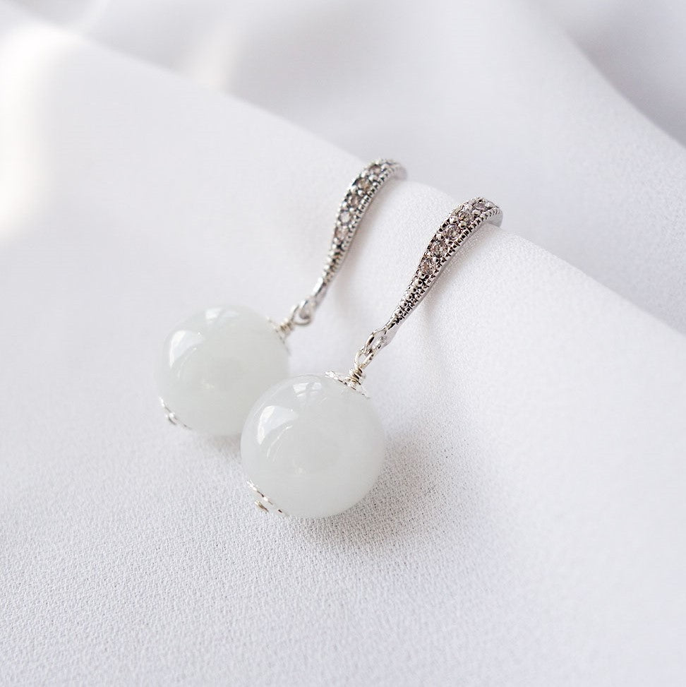 White clearance ball earrings